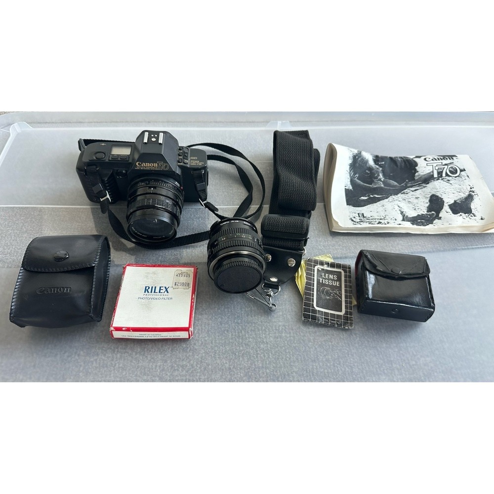 Canon T70 35mm Camera Lot. Body, 3 Lenses, Flash, Bag. Works Great!